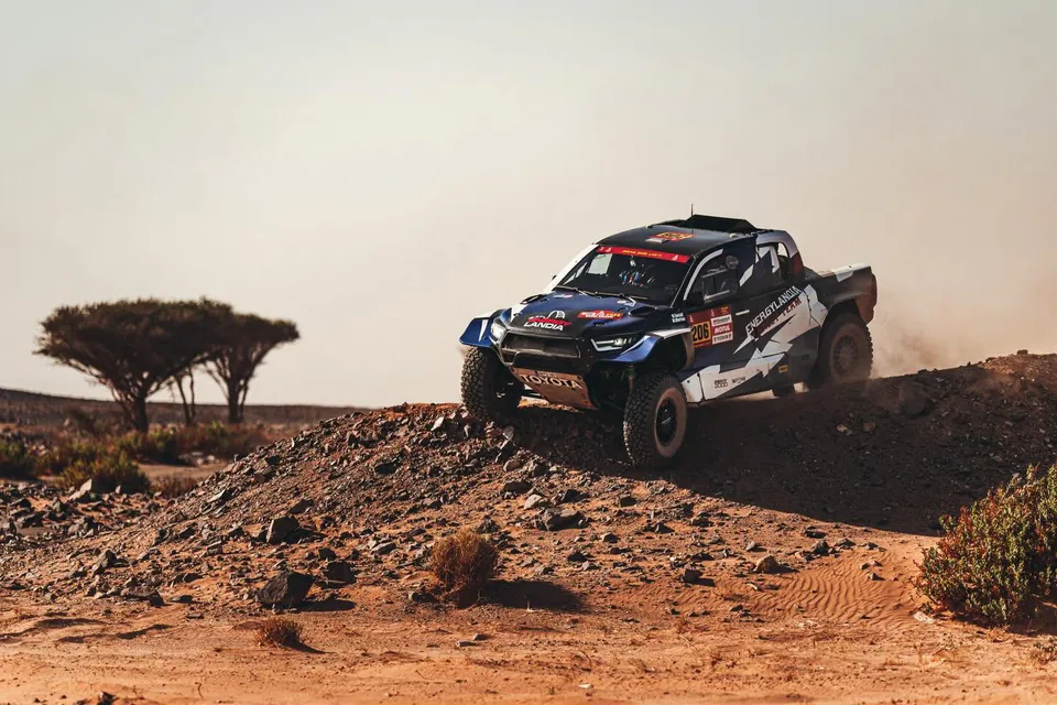 Energylandia Rally Team car on a stony stretch of desert