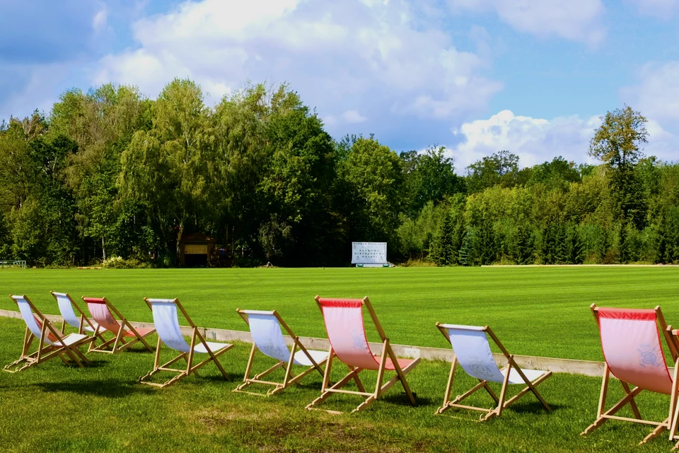 The Warsaw Polo Club pitch with deckchairs along the sideline